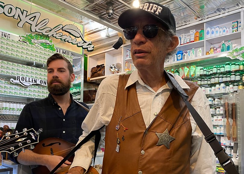 Thompson Street Medicine Show musicians playing in store